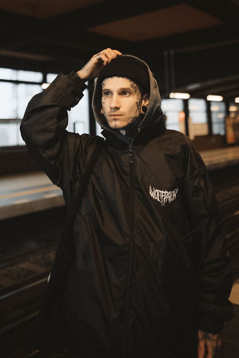 Black windbreaker with WOLFPACK WINDBREAKER UNISEX print - Wolfpack Clothing