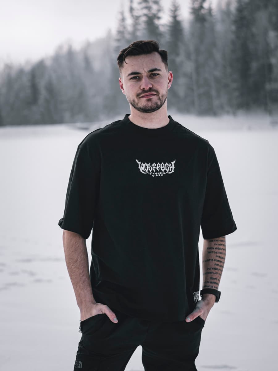 Black oversized t-shirt with NORTH POLE OVERSIZED TEE UNISEX print - Wolfpack Clothing