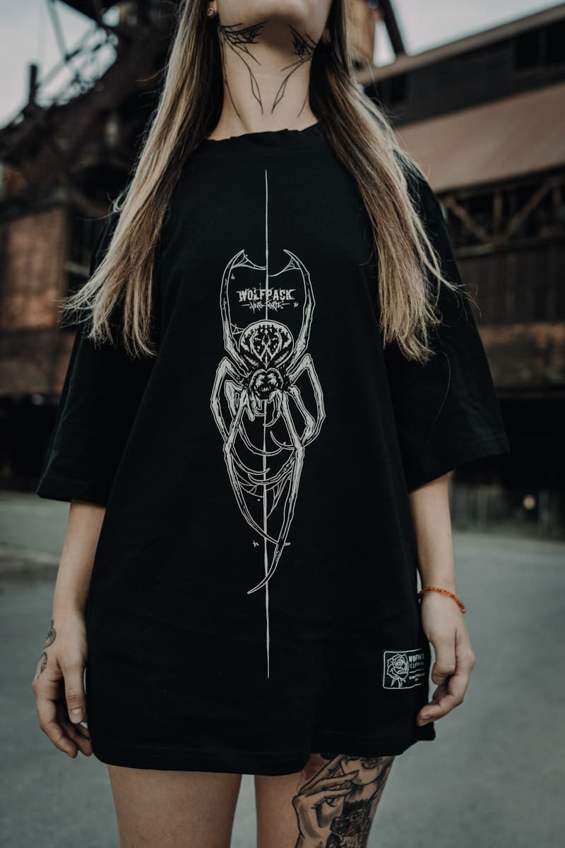 Black oversized t-shirt with CONNECTION OVERSIZED TEE UNISEX print - Wolfpack Clothing