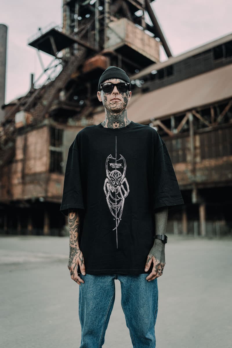 Black oversized t-shirt with CONNECTION OVERSIZED TEE UNISEX print - Wolfpack Clothing