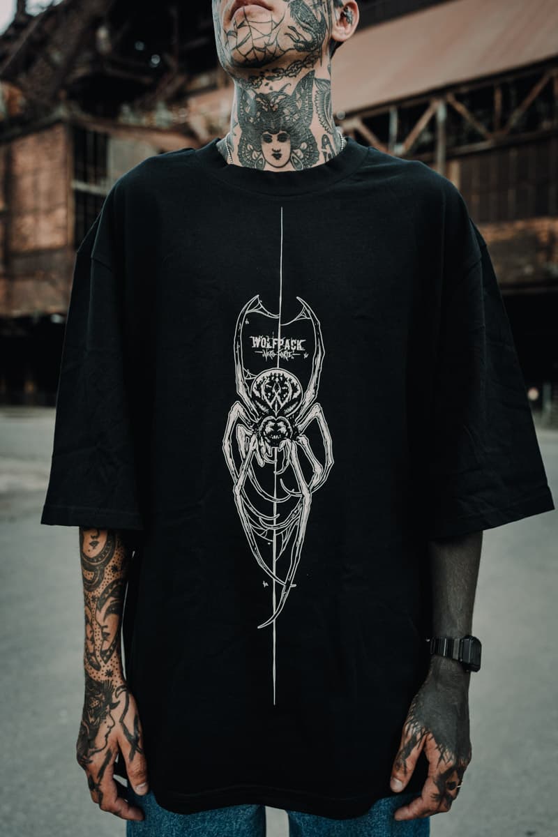 Black oversized t-shirt with CONNECTION OVERSIZED TEE UNISEX print - Wolfpack Clothing
