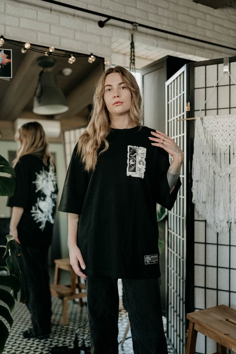 Black oversized t-shirt with THE DUALITY OVERSIZED TEE UNISEX print - Wolfpack Clothing