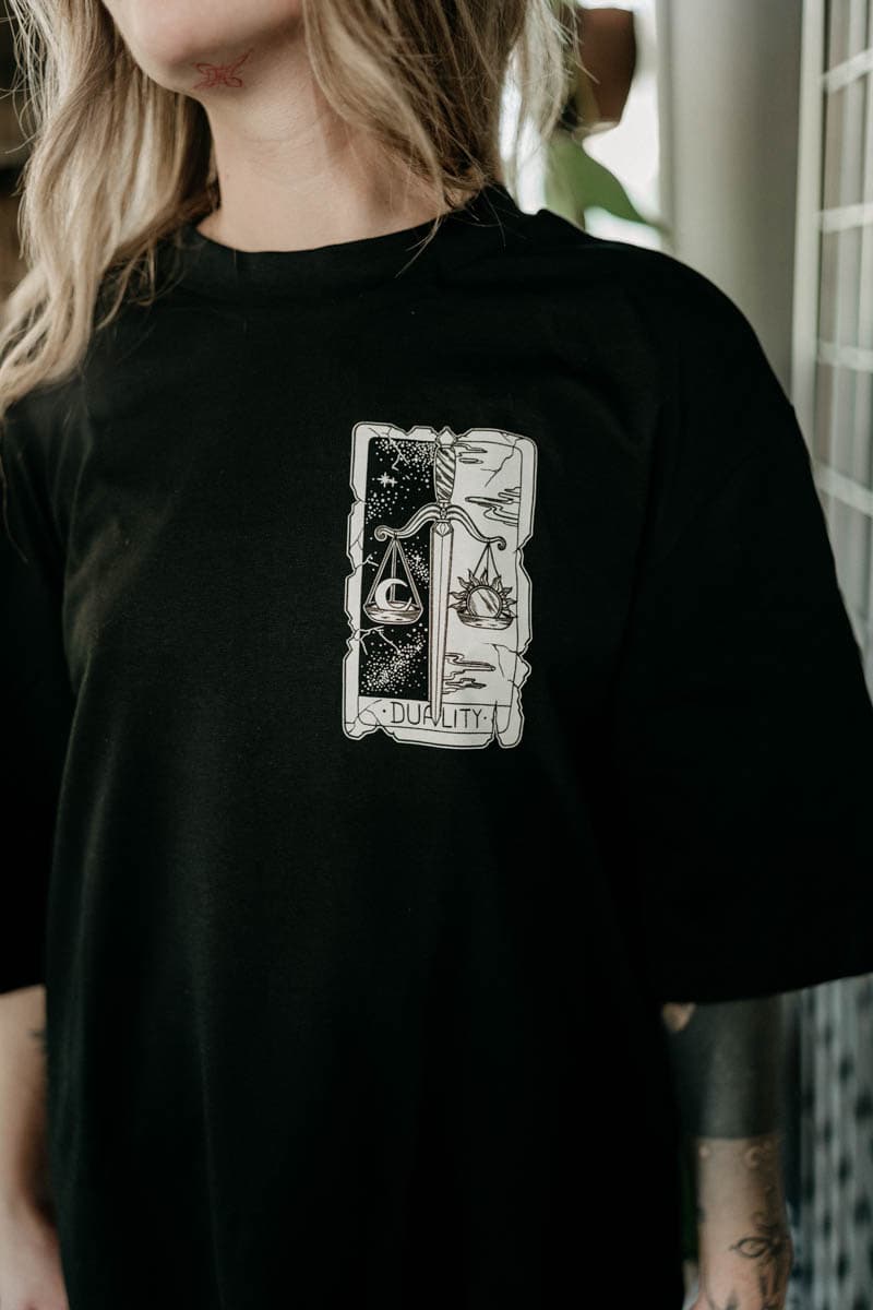 Black oversized t-shirt with THE DUALITY OVERSIZED TEE UNISEX print - Wolfpack Clothing