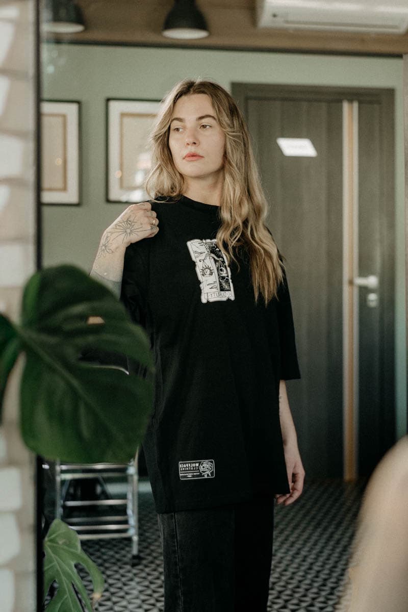 Black oversized t-shirt with THE DUALITY OVERSIZED TEE UNISEX print - Wolfpack Clothing