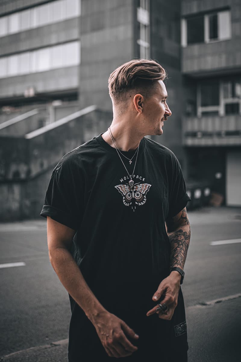 Black t-shirt with ELUSIVE BUTTERFLY TEE UNISEX print - Wolfpack Clothing