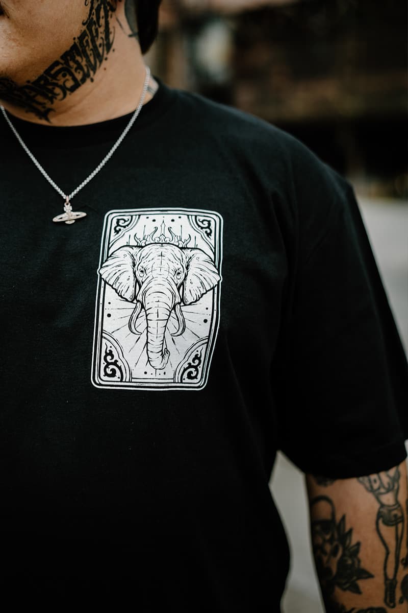Black t-shirt with ROYAL TUSKS TEE UNISEX print - Wolfpack Clothing