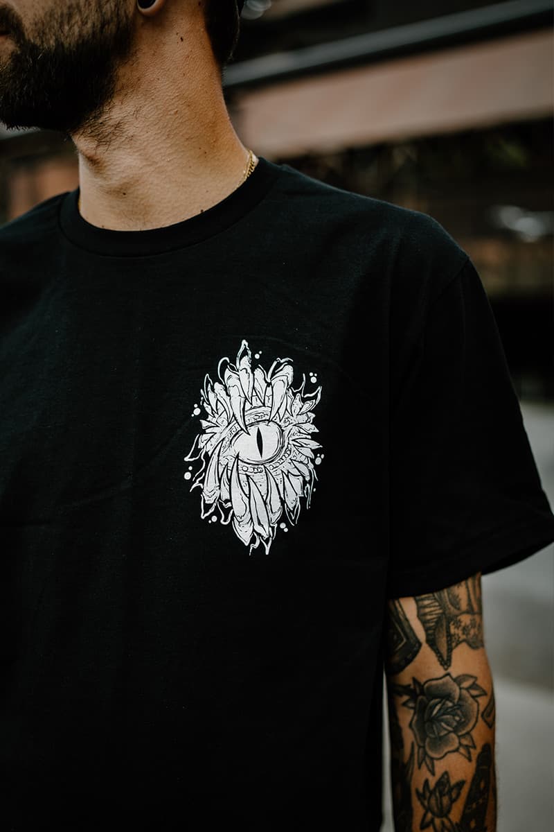 Black t-shirt with SCALES & SILENCE TEE UNISEX print - Wolfpack Clothing