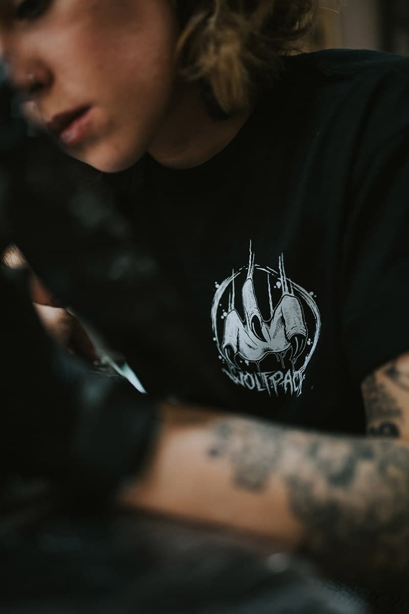 Black t-shirt with THE HUNTERS TEE UNISEX print - Wolfpack Clothing