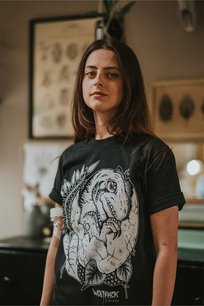 Black t-shirt with THE NEWBORN TEE UNISEX print - Wolfpack Clothing