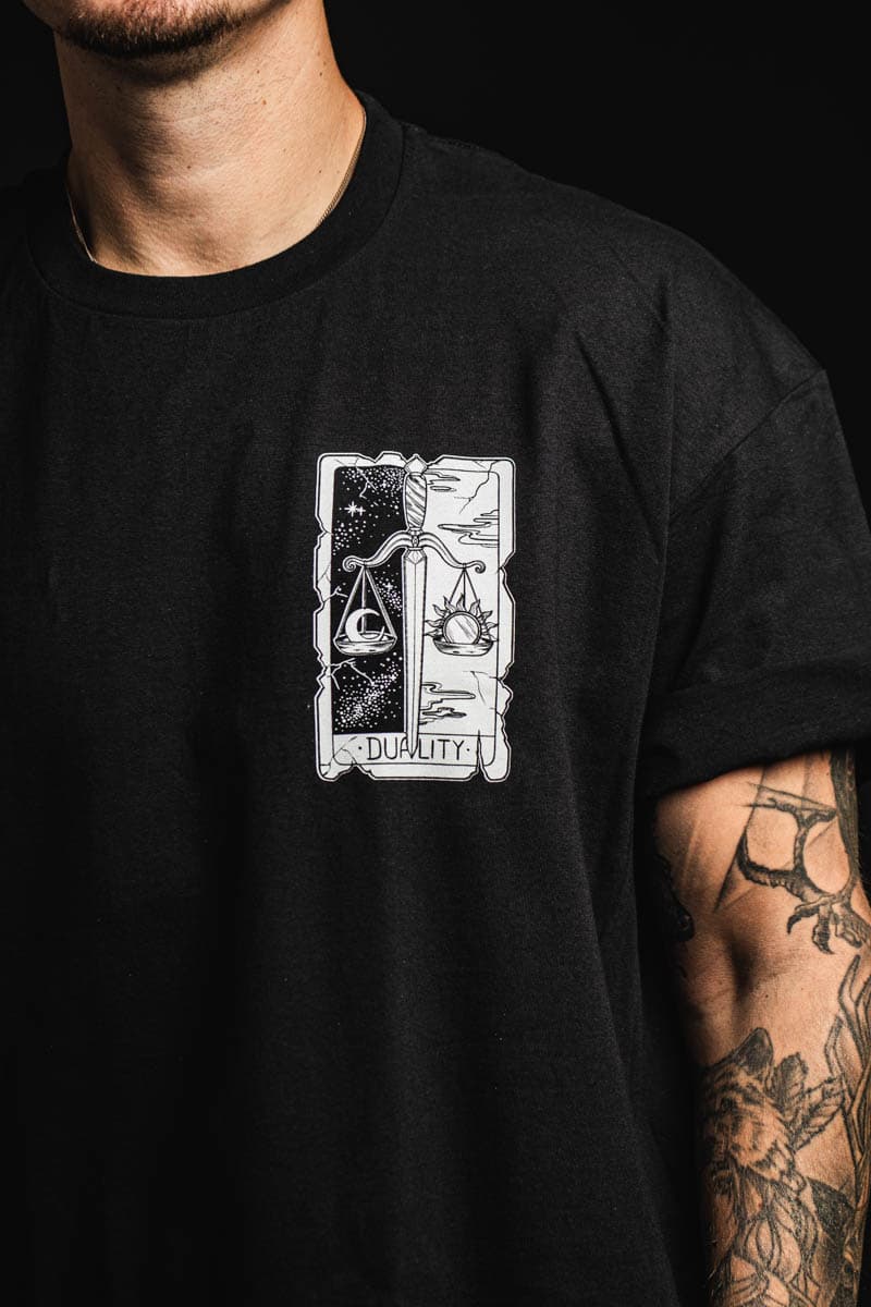 Black t-shirt with THE DUALITY TEE UNISEX print - Wolfpack Clothing