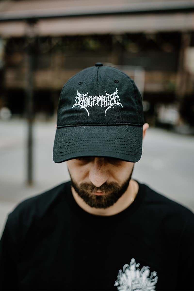 Black hat with BLACK LOTUS FIVE PANEL CAP print - Wolfpack Clothing