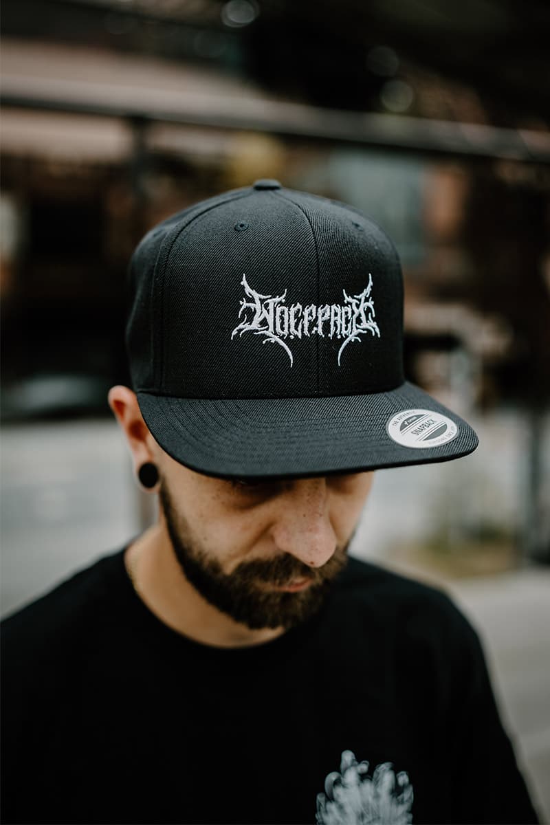 Black hat with BLACK LOTUS SNAPBACK print - Wolfpack Clothing