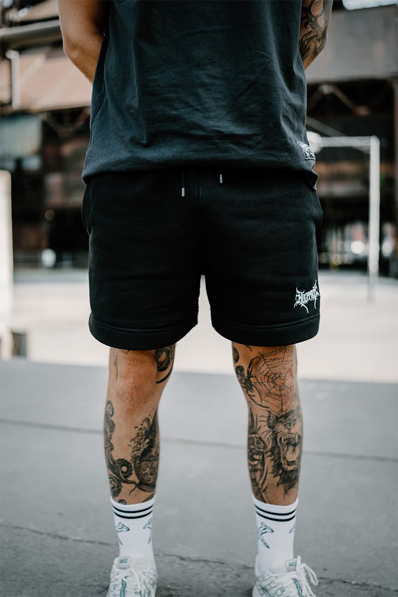 Black shorts with WOLFPACK RELAX TRACK SHORTS print - Wolfpack Clothing