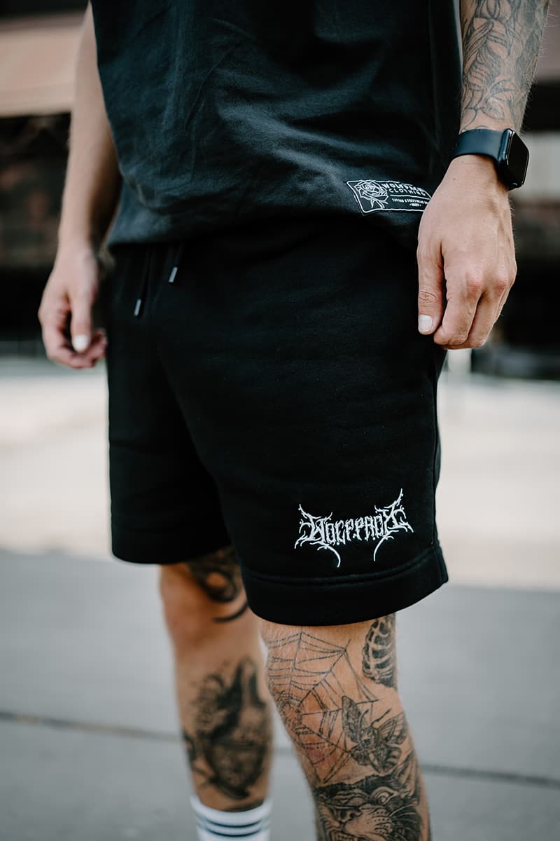 Black shorts with WOLFPACK RELAX TRACK SHORTS print - Wolfpack Clothing
