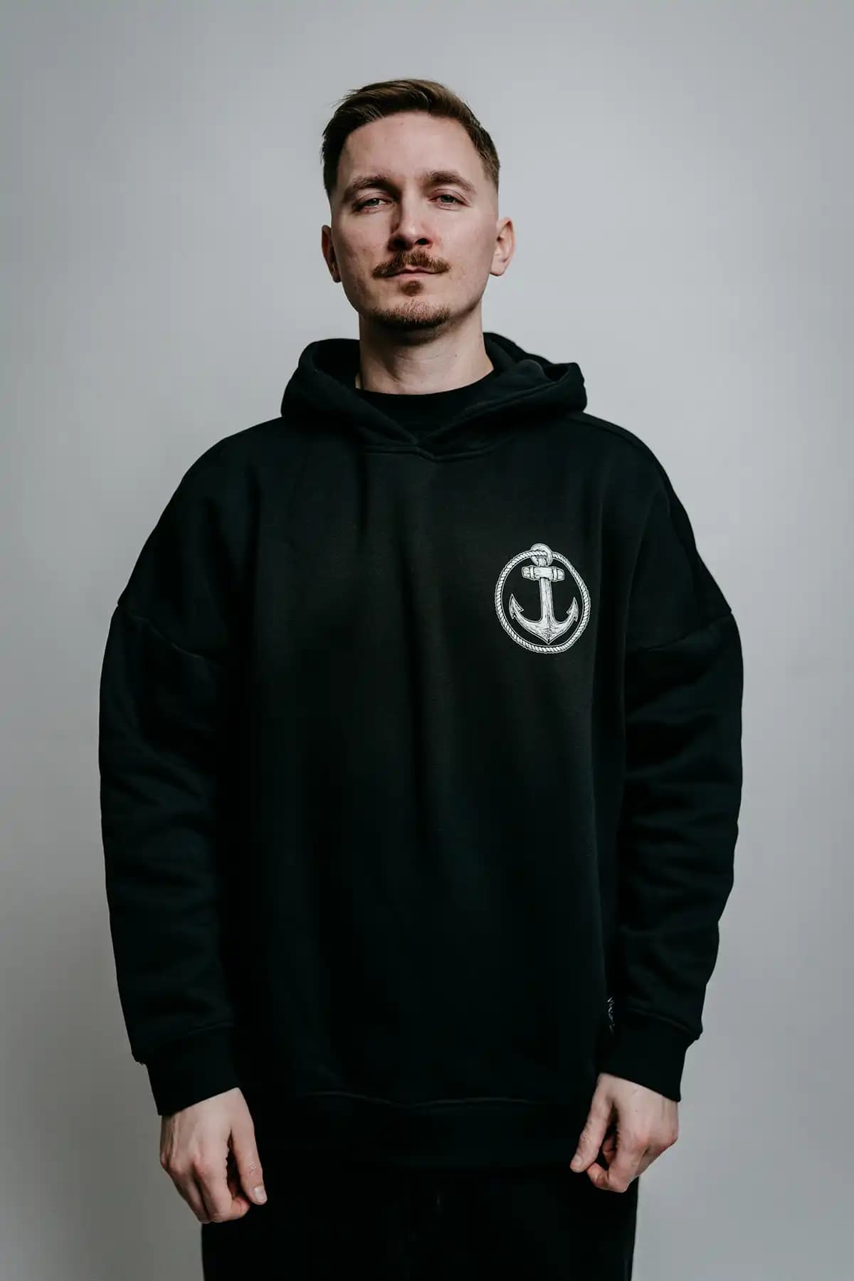Black oversized hoodie with THE CHOKER OVERSIZED HOODIE UNISEX print - Wolfpack Clothing