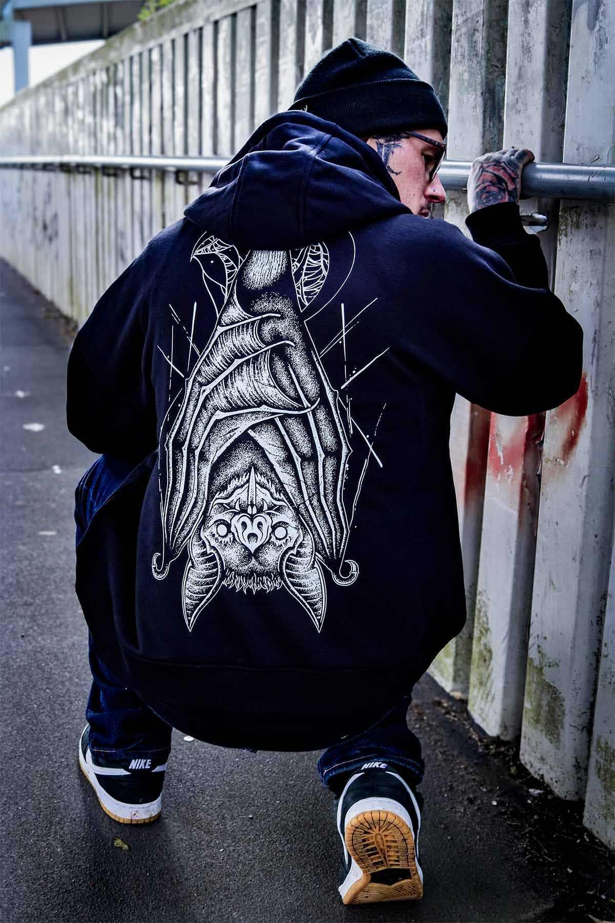 Black oversized hoodie with ECLIPSE OVERSIZED HOODIE UNISEX print - Wolfpack Clothing