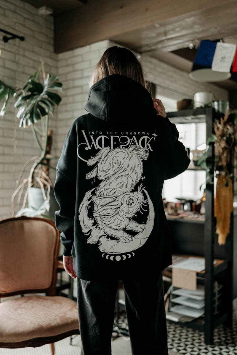 Black oversized hoodie with INTO THE UNKNOWN OVERSIZED HOODIE UNISEX print - Wolfpack Clothing