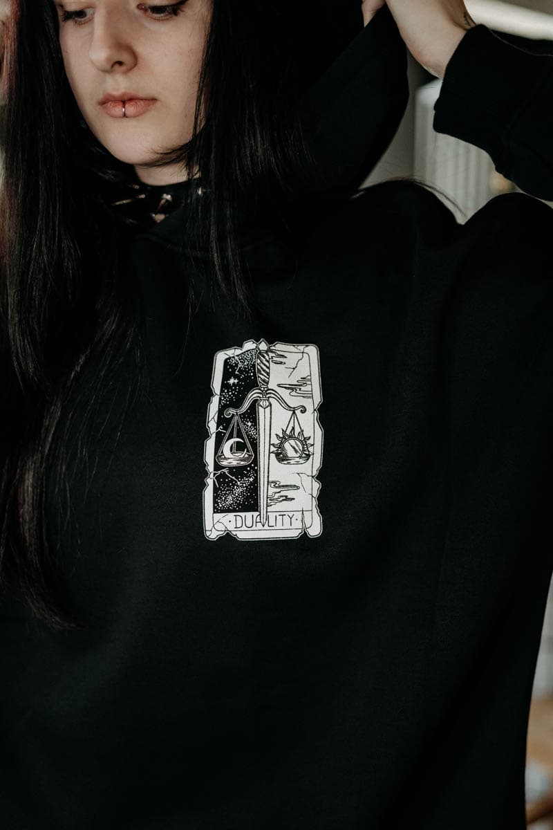 Black oversized hoodie with THE DUALITY OVERSIZED HOODIE UNISEX print - Wolfpack Clothing