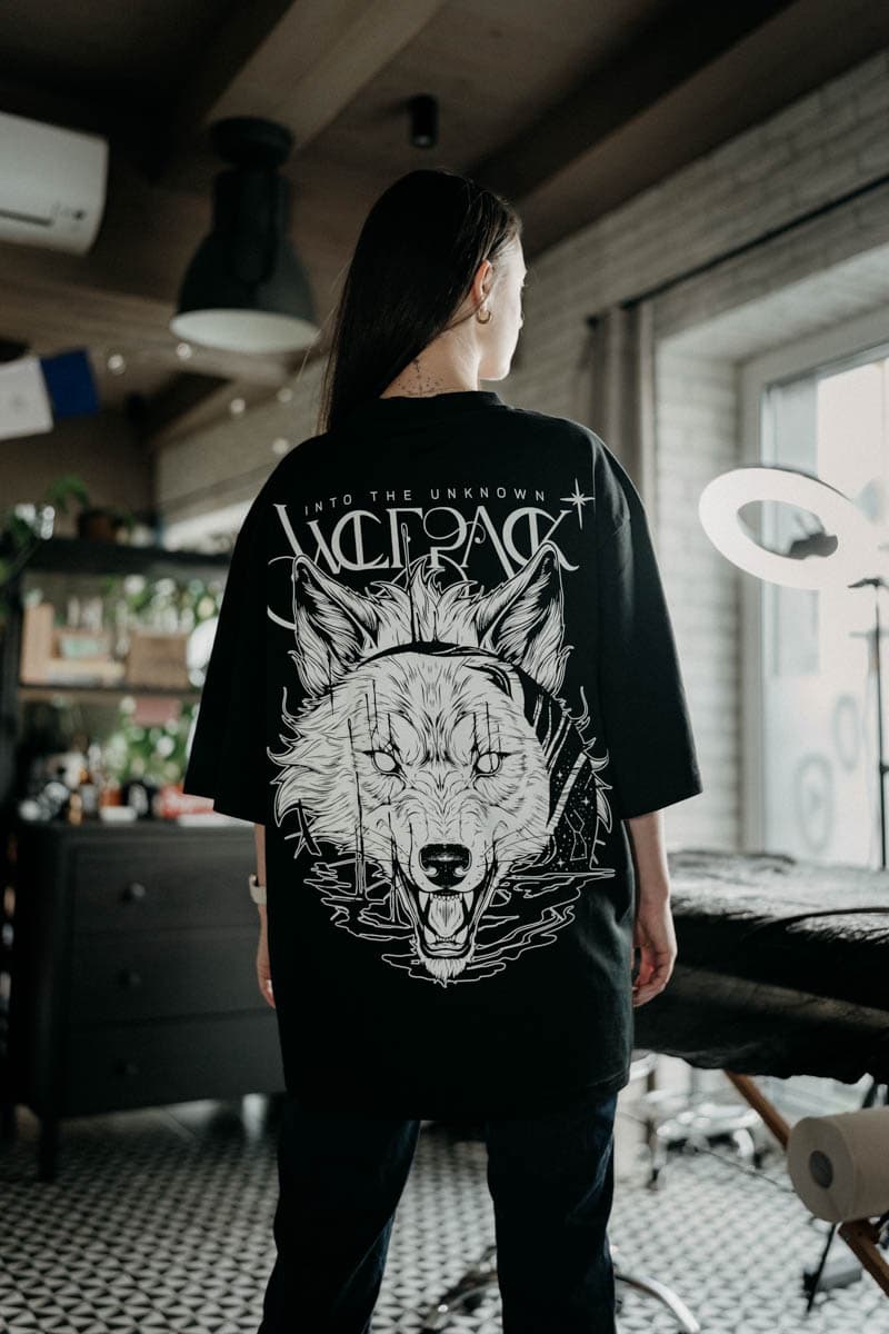 Black oversized t-shirt with CALL OF THE WILD OVERSIZED TEE UNISEX print - Wolfpack Clothing