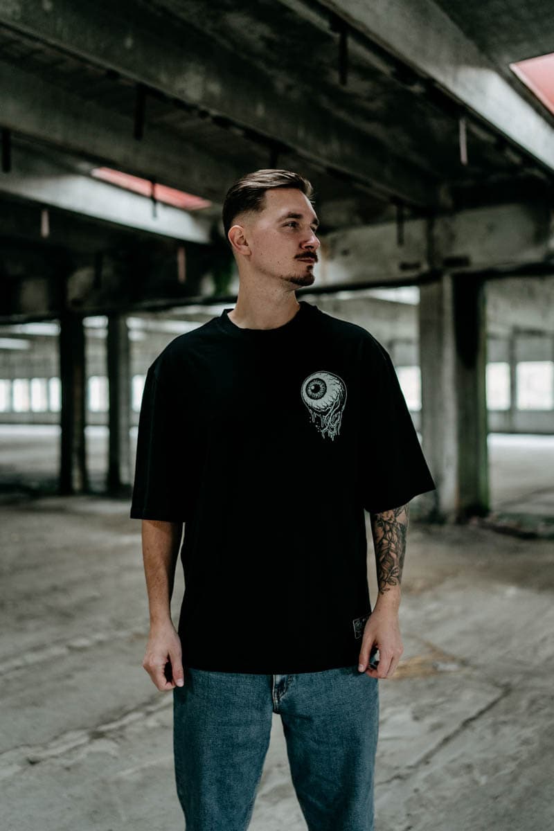 Black oversized t-shirt with INNER EYE OVERSIZED TEE UNISEX print - Wolfpack Clothing