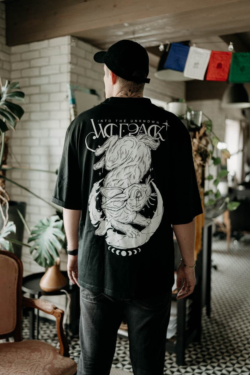 Black oversized t-shirt with INTO THE UNKNOWN OVERSIZED TEE UNISEX print - Wolfpack Clothing