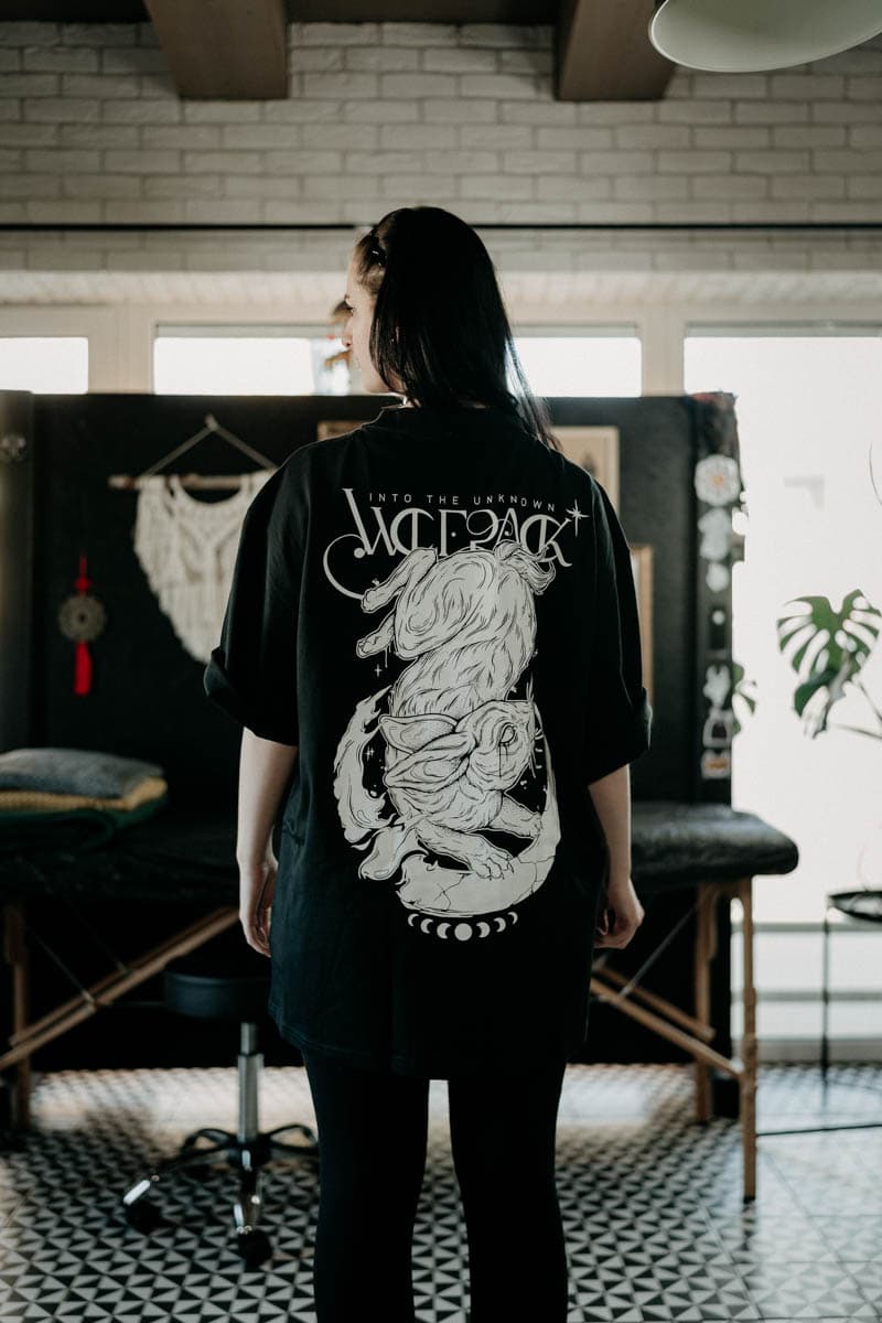 Black oversized t-shirt with INTO THE UNKNOWN OVERSIZED TEE UNISEX print - Wolfpack Clothing