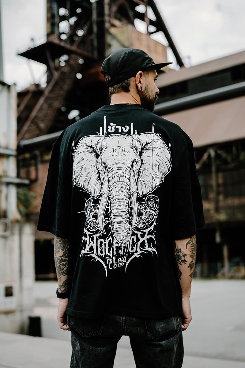 Black oversized t-shirt with ROYAL TUSKS OVERSIZED TEE UNISEX print - Wolfpack Clothing