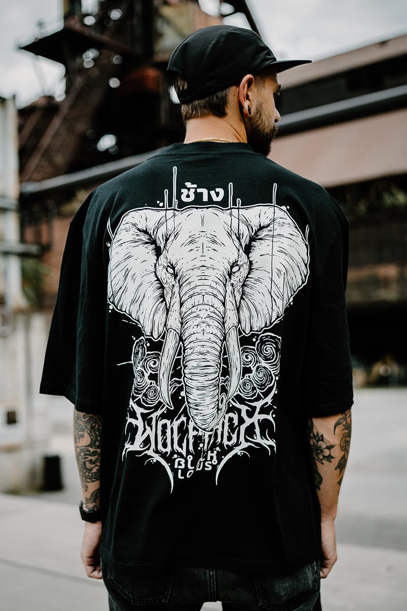 Black oversized t-shirt with ROYAL TUSKS OVERSIZED TEE UNISEX print - Wolfpack Clothing