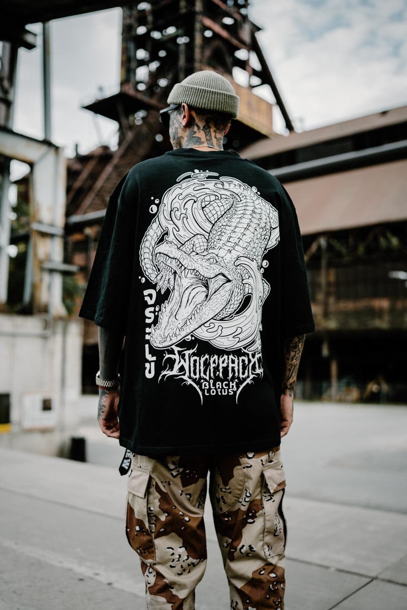 Black oversized t-shirt with SCALES & SILENCE OVERSIZED TEE UNISEX print - Wolfpack Clothing