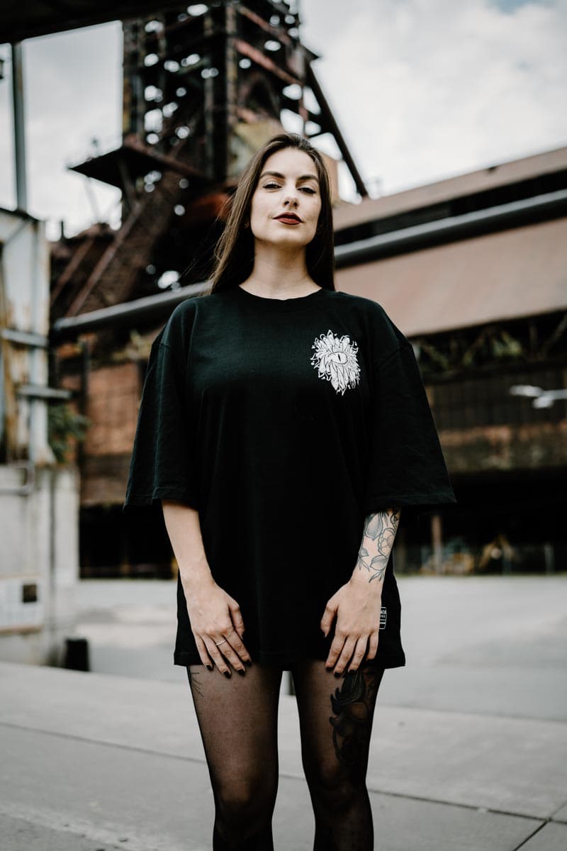 Black oversized t-shirt with SCALES & SILENCE OVERSIZED TEE UNISEX print - Wolfpack Clothing