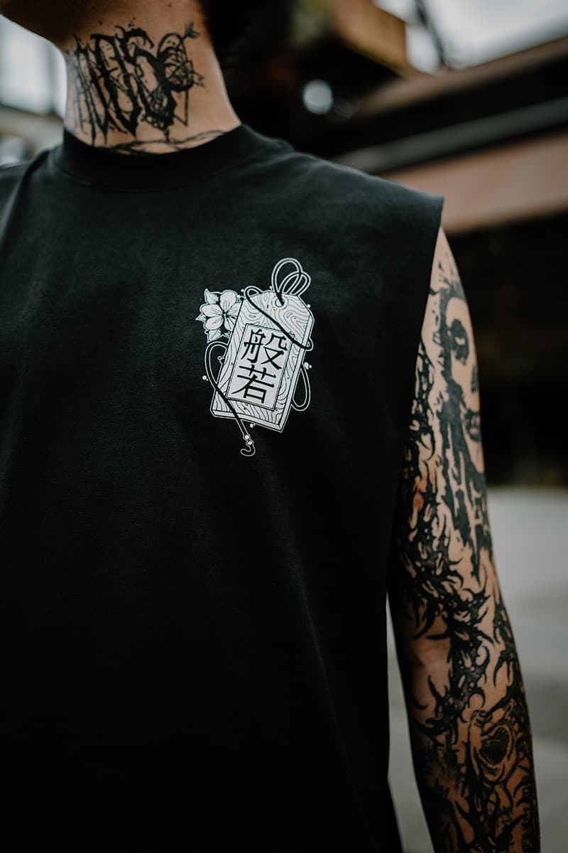 Black heavy tank top with HANNYA HEAVY FADED TANK UNISEX print - Wolfpack Clothing