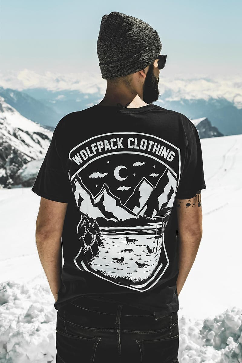 Black t-shirt with WILDERNESS FOXES TEE UNISEX print - Wolfpack Clothing